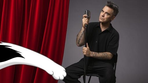 Felix i Robbie Williams śpiewają przy mikrofonie